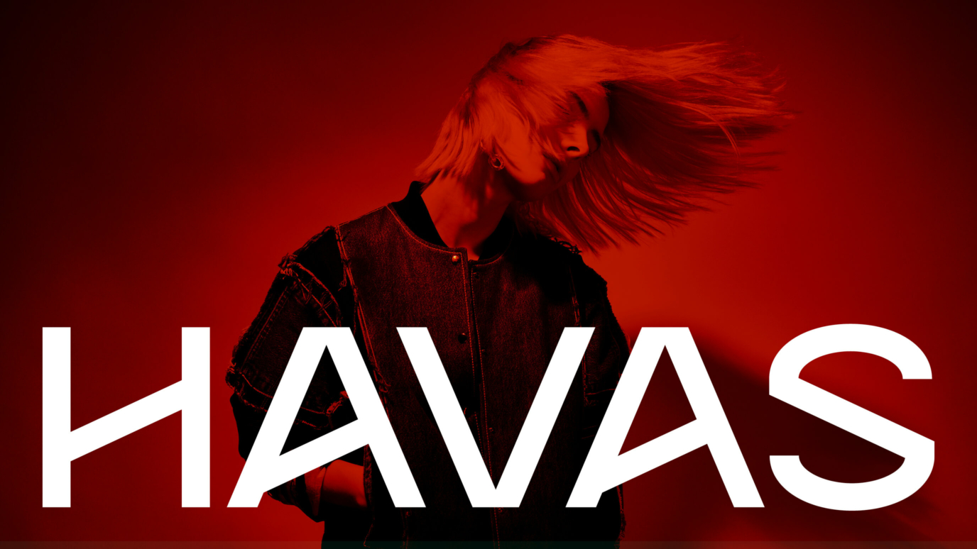 Havas logo with woman dancing