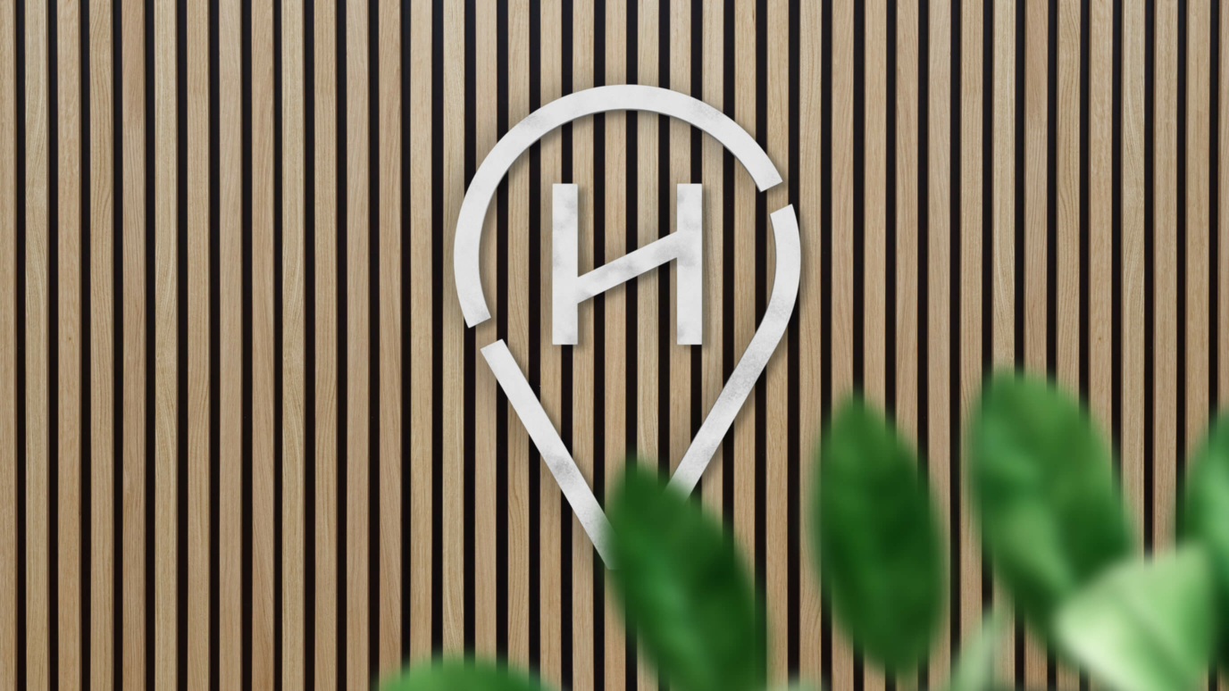 Havas logo on wooden panel wall