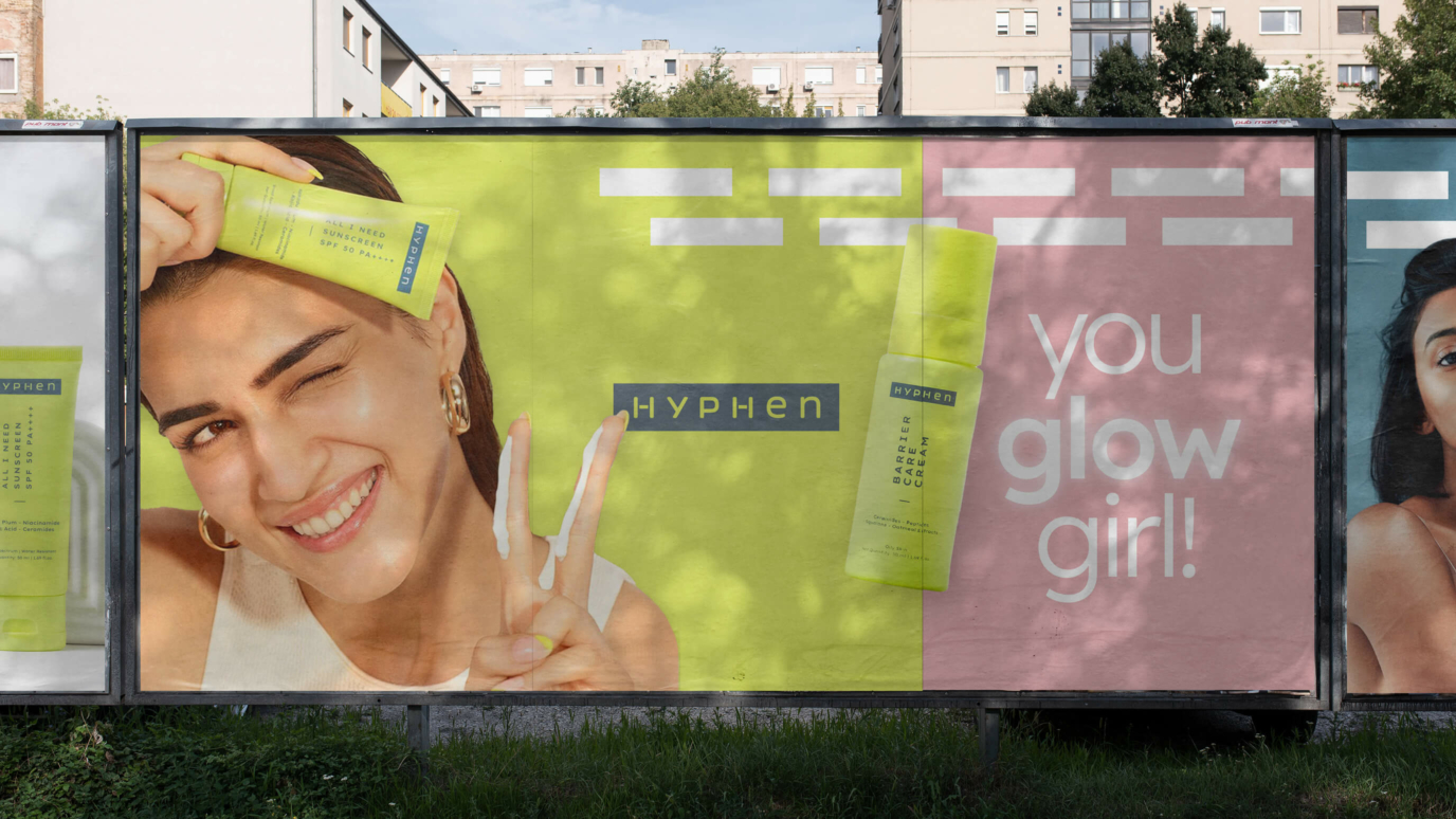 Hyphen billboard saying you glow girl!