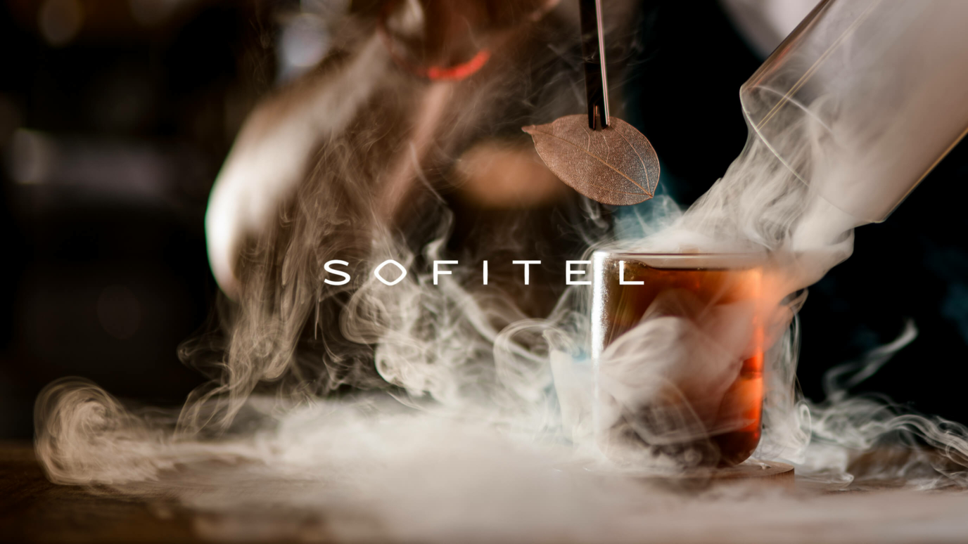 Sofitel logo with smokey drink