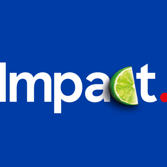 The word 'impact' with a slice of lime replacing the 'c'