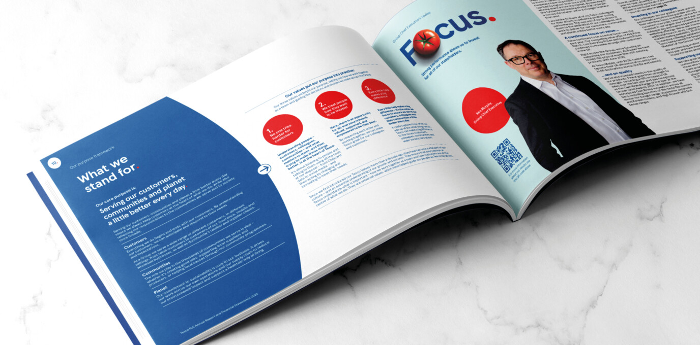 Open spread of Tesco's 2025 annual report on marble counter